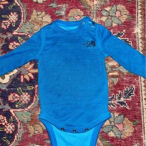 The North Face onesie
